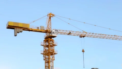 Panorama of a working crane against a beautiful sky Stock Footage 89498848