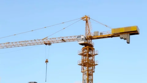 Panorama of a working crane against a beautiful sky Stock Footage 89498895