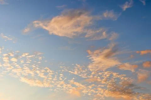 Panorama of yellow dramatic cumulus clouds in the sky before the sunset Photos