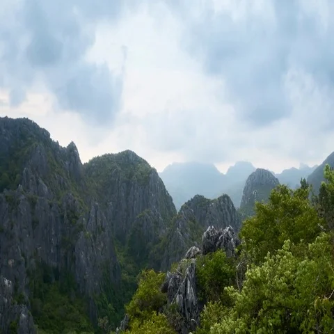Panoramic 4K timelapse video of Thai mountains in beautiful tropical rainforest Stock Footage 69515069
