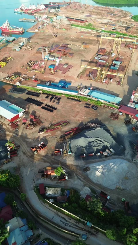 Panoramic aerial of a colossal shipyard and port area, illustrating complex.. Stock Footage 337283268