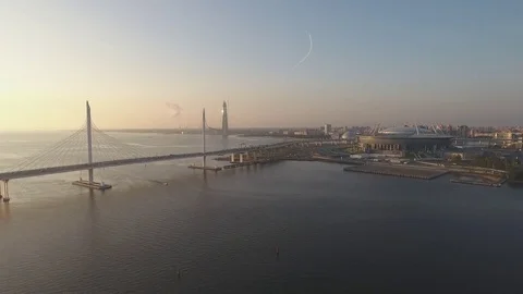 Panoramic aerial drone footage view of a suspension bridge across the Gulf of Fi Stock Footage 80601626