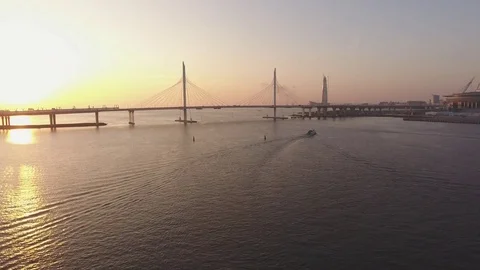 Panoramic aerial drone footage view of a suspension bridge across the Gulf of Fi Stock Footage 80601790