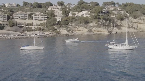 Panoramic aerial drone round of beach, Portal Vells, Mallorca, Raw 4k. Stock Footage 89866305
