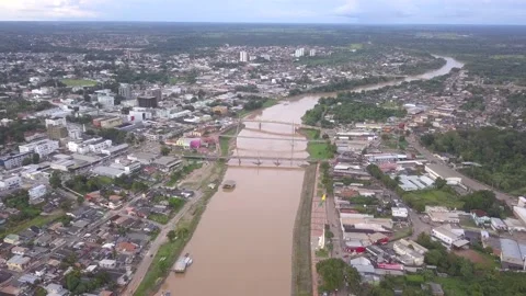 Panoramic aerial drone view of Acre river. Rio Branco city skyline, Amazon. Stock Footage 131559439
