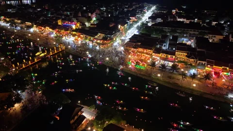 Panoramic aerial drone view of Hoi An Ancient town with boat tour in evening 스톡 동영상 308955825