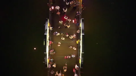 Panoramic aerial drone view of Hoi An Ancient town with boat tour in evening Stock-Footage 308957214