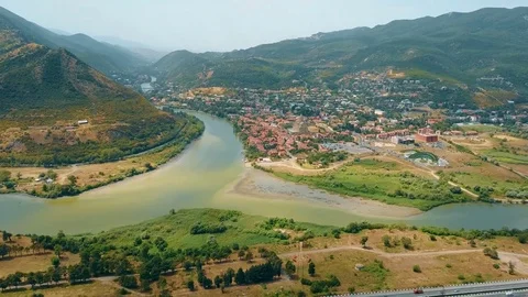 Panoramic aerial drone view of Mtskheta, Georgia with Svetitskhoveli Cathedral Stock Footage 81379501