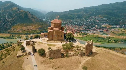Panoramic aerial drone view of Mtskheta, Georgia with Svetitskhoveli Cathedral Stock-Footage 81379560