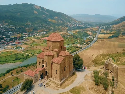 Panoramic aerial drone view of Mtskheta, Georgia with Svetitskhoveli Cathedral Stock Footage 81379595