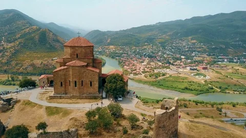 Panoramic aerial drone view of Mtskheta, Georgia with Svetitskhoveli Cathedral Video stock 81379715