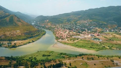 Panoramic aerial drone view of Mtskheta, Georgia with Svetitskhoveli Cathedral Stock Footage 81379739