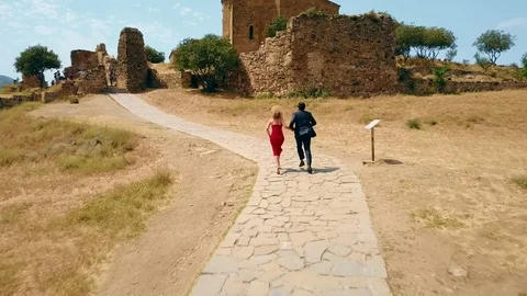 Panoramic aerial drone view of Mtskheta, Georgia with Svetitskhoveli Cathedral Stock Footage 81379789