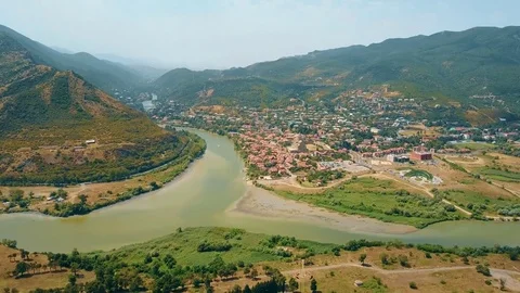 Panoramic aerial drone view of Mtskheta, Georgia with Svetitskhoveli Cathedral Stock Footage 81379796
