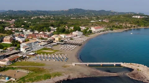 Panoramic aerial drone view of the northern coast of Corfu island at Roda Beach Stock Footage 325404129
