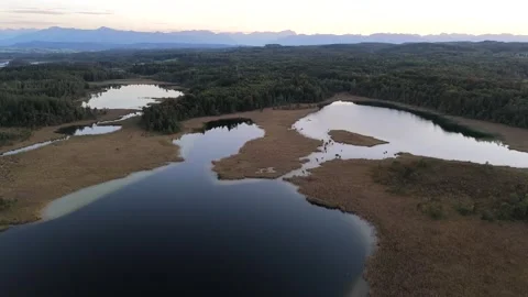Panoramic aerial drone view of Osterseen nature reserve near Iffeldorf, Bavaria Stock Footage 317760515