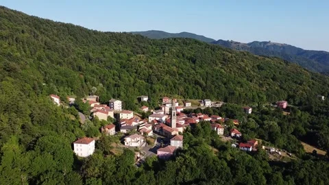 Panoramic aerial drone view of small mountain village called Alpe in Apennines Stock Footage 247837286