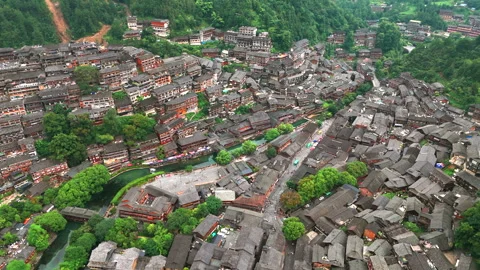 Panoramic Aerial Drone View of Xijiang Qianhu Miao Village and Rice Plantation Stock Footage 341743780