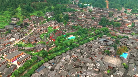 Panoramic Aerial Drone View of Xijiang Qianhu Miao Village and Rice Plantation Stock Footage 341752670