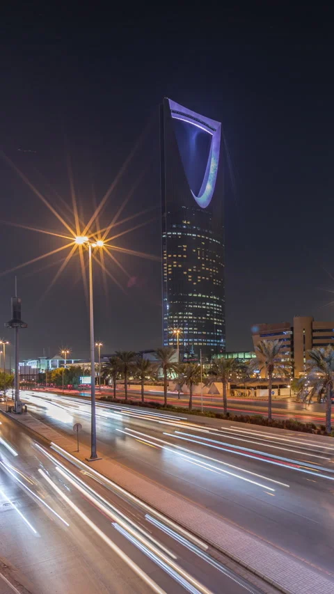 Panoramic aerial night timelapse Riyadh highway traffic, Kingdom Tower view Stock Footage 324962736