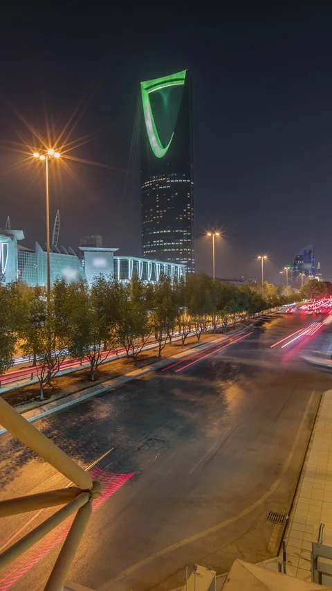 Panoramic aerial night timelapse Riyadh highway traffic, Kingdom Tower view Stock Footage 324963171