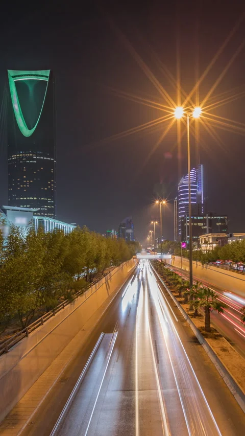 Panoramic aerial night timelapse Riyadh highway traffic, Kingdom Tower view Stock Footage 324963204