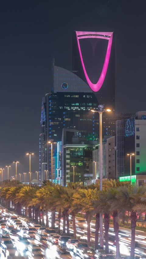 Panoramic aerial night timelapse Riyadh highway traffic, Kingdom Tower view Stock Footage 324963888
