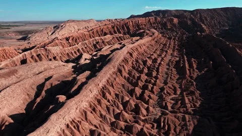 Panoramic aerial over dramatic eroded salt rock badlands with sharp ridges and Stockbeeldmateriaal 336266372