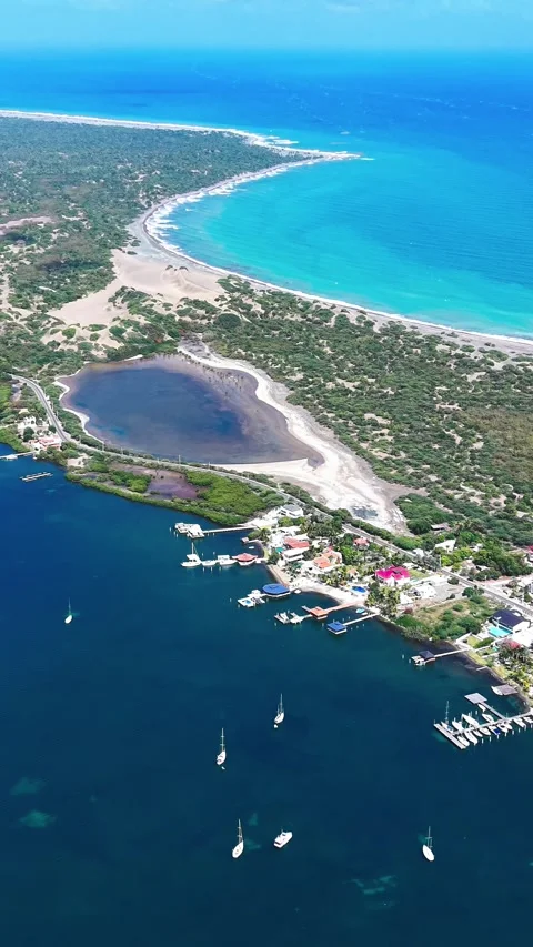 Panoramic Aerial Shot of Las Salinas Coastal Lagoon and Dunes in Bani Stock Footage 335654467