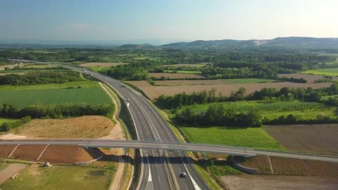 Panoramic aerial top drone view of modern high speed highway Stock Footage 219217453