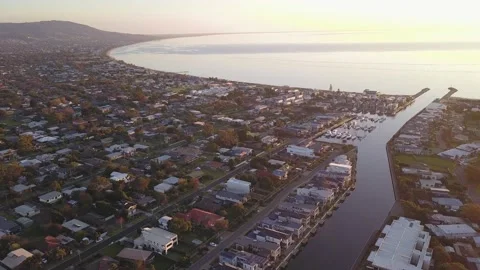 Panoramic aerial top view with drone flying high on a beautiful pier in sunset Stock Footage 132800014