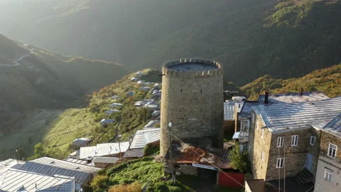 Panoramic aerial view of ancient tower of Derbent. Old town in a mountain valley Stock Footage 144064836