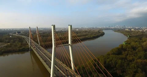 Panoramic Aerial View Of A Bridge With Orange Ropes And City Stock Footage 86320001