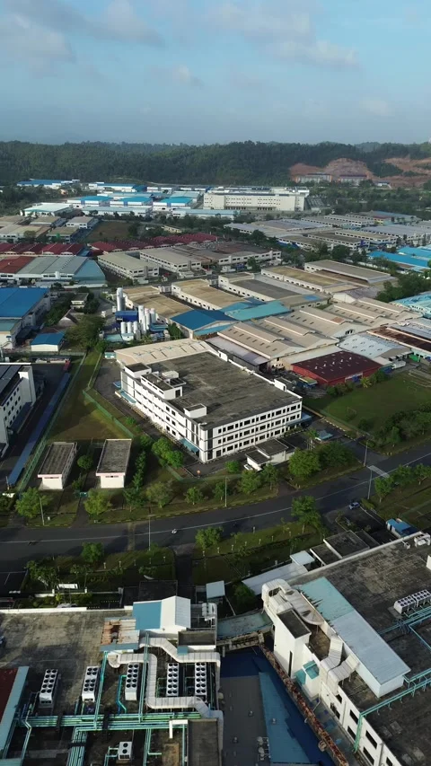 Panoramic aerial view capturing an expansive modern industrial park featuri.. Video stock 339040225