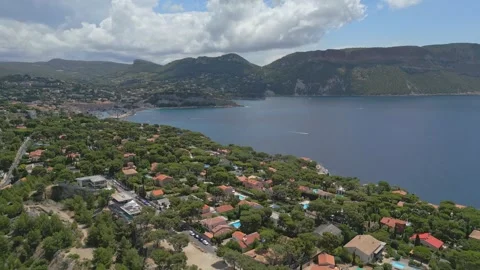 Panoramic aerial view of Cassis and the shimmering Mediterranean Sea Stock Footage 313384247