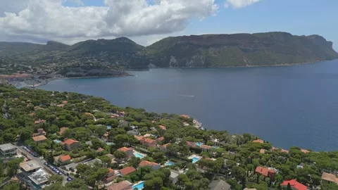 Panoramic aerial view of Cassis and the shimmering Mediterranean Sea Stock Footage 313384249