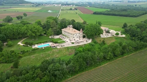 Panoramic aerial view of Chateau Les Oliviers de Salettes, Charols - France Stock Footage 243838331