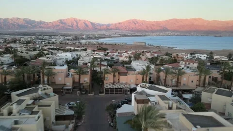 Panoramic aerial view of eilat coastline at evening, with Ships anchoring at the Stock Footage 155949493