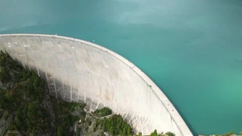 Panoramic Aerial View of Emosson Dam and Alpine Lake in Finhaut, Switzerland Stock Footage 317769461