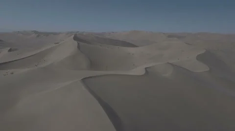 Panoramic aerial view of empty desolate sand dunes in Chinese desert Stock Footage 67519484