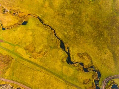 Panoramic aerial view of fields, road and river. Bird's-eye view of the land Stock Photos