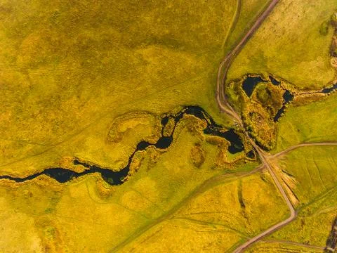 Panoramic aerial view of fields, road and river. Bird's-eye view of the land Stock Photos