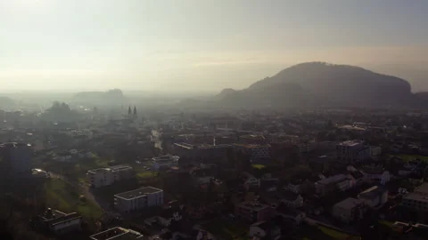 Panoramic Aerial View of Götzis and the Kummenberg in Morning Haze Stock Footage 336336012