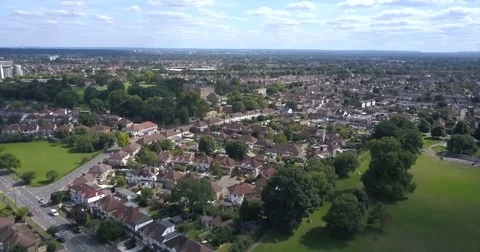 Panoramic aerial view of housing &amp; green spaces in affluent London suburb Stock-Footage 80293100