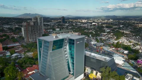 Panoramic Aerial View Of The Insigne tower And Famous San Salvador buildings Stock Footage 147157310