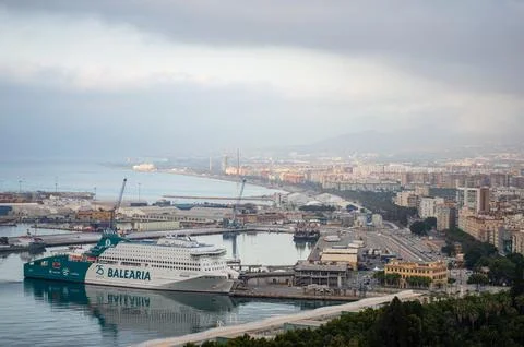 Panoramic aerial view of Malaga in a cloudy summer day Stock Photos
