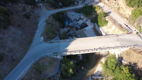 Panoramic aerial view of a modern road bridge and an old tourist footbridge Stock Footage 343961399