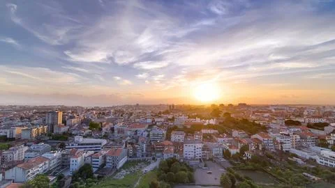Panoramic aerial view over Rooftops of Porto's old town on a warm spring even Fotos Stock