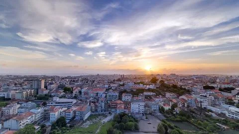 Panoramic aerial view over Rooftops of Porto's old town on a warm spring even Fotos Stock