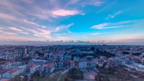 Panoramic aerial view over Rooftops of Porto's old town on a warm spring even Fotos Stock